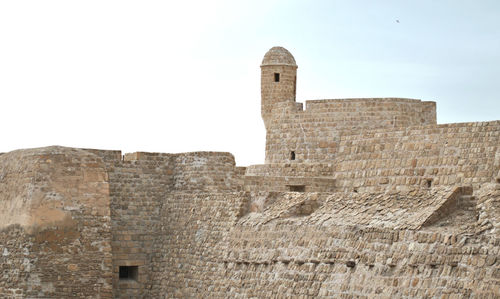 Low angle view of fort against the sky