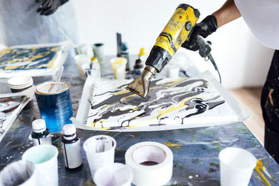 High angle view of man working on table