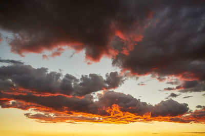 Low angle view of dramatic sky during sunset