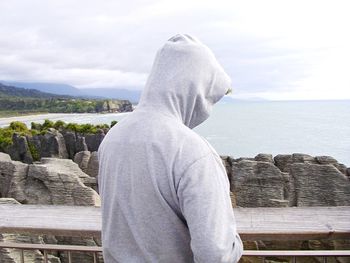 People looking at mountain landscape