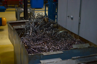 High angle view of rusty metal in container