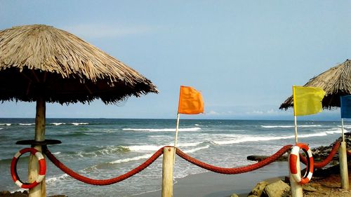 Panoramic view of beach against clear sky