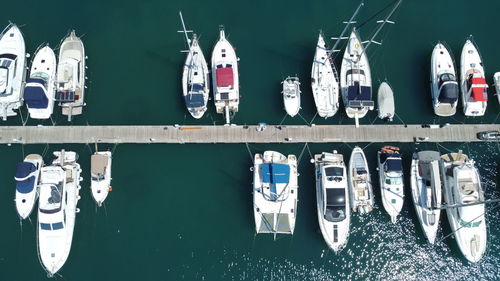 High angle view of boats moored at harbor