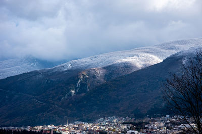 Scenic view of snowcapped mountains against sky