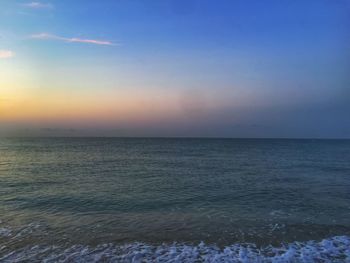 Scenic view of sea at sunset