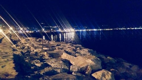 View of illuminated rocks at night