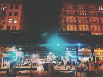 People on street at night