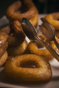 Close-up of bread in plate on table