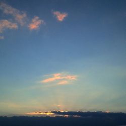Scenic view of landscape against sky during sunset