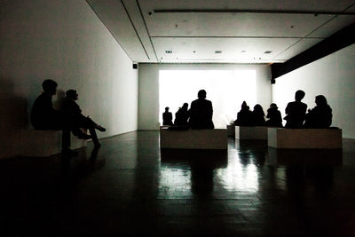 Woman standing in corridor