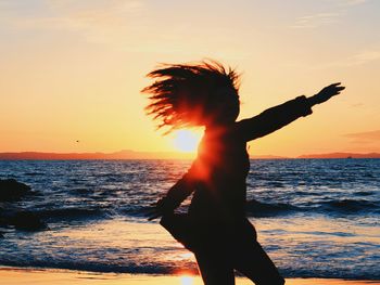 Scenic view of sea at sunset