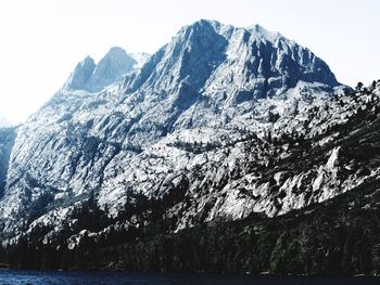 Scenic view of snowcapped mountains against clear sky