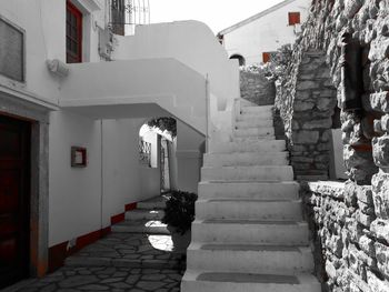 Alley amidst buildings in city