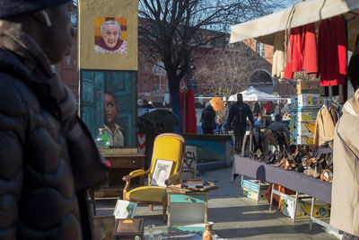 People on street market in city