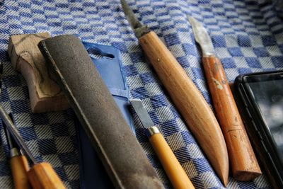 High angle view of objects on wood