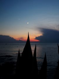 Silhouette of temple during sunset