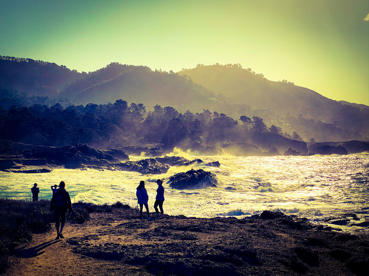 SILHOUETTE PEOPLE ON BEACH AGAINST SKY DURING SUNSET