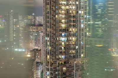 Illuminated buildings in city at night