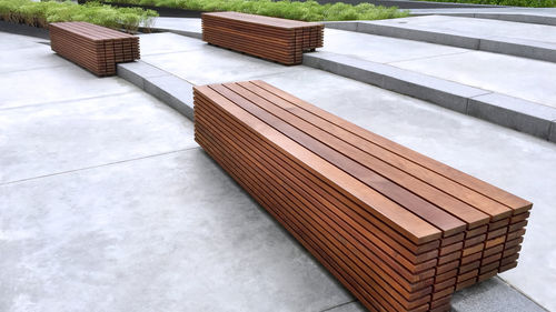 Wooden benches on stair steps in the park