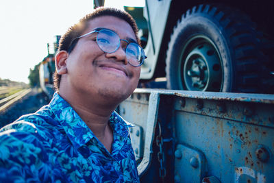 Portrait of young man outdoors