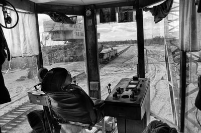 View of people sitting in window