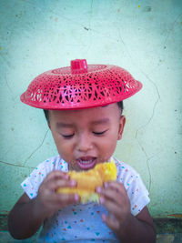 Portrait of cute girl holding ice cream