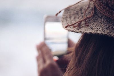 Portrait of woman photographing