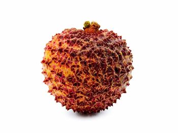 Close-up of strawberry against white background