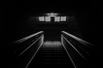 High angle view of staircase in dark