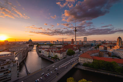 High angle view of city buildings during sunset