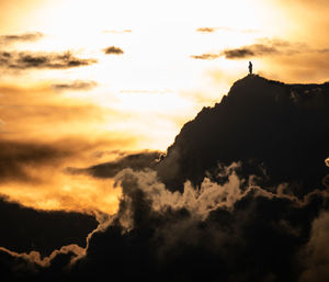 Low angle view of dramatic sky during sunset