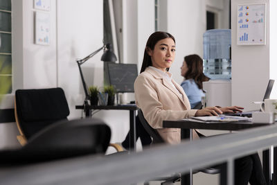 Portrait of doctor working in office