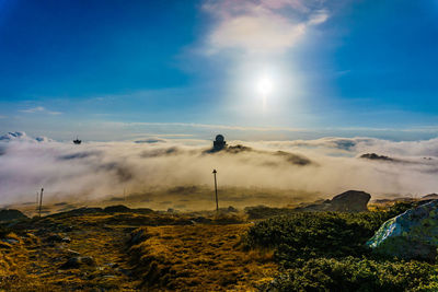 Scenic view of land against sky