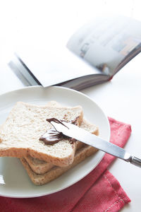 High angle view of bread in plate on table