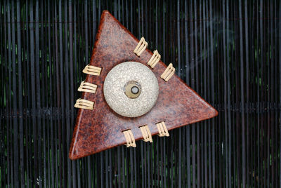 Directly above shot of rusty metal on wood