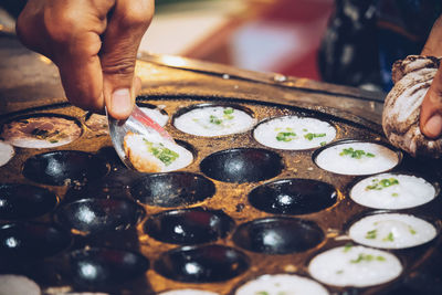 Close-up of person preparing food