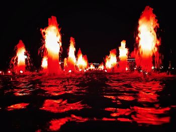 View of bonfire at night