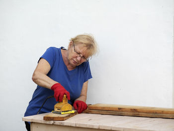 Man working on wall