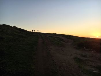 Scenic view of landscape at sunset