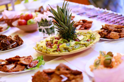 Fruits in plate on table