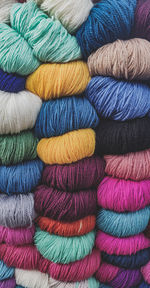 Full frame shot of multi colored cloths and wool