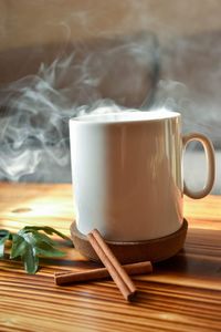 Close-up of coffee cup on table