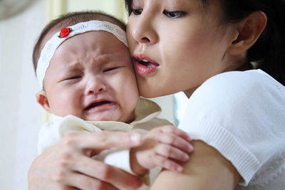 Portrait of mother and baby