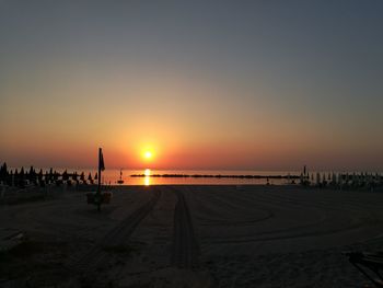 View of beach at sunset