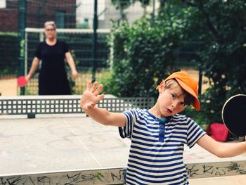 Boy playing table tennis