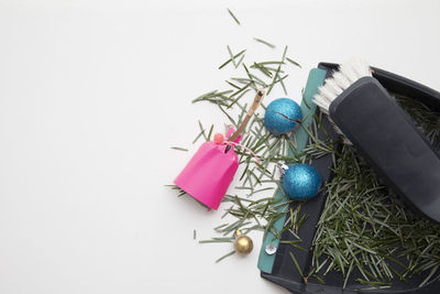 High angle view of christmas decorations on white background