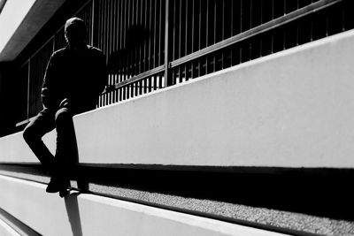 Man walking on railroad station platform