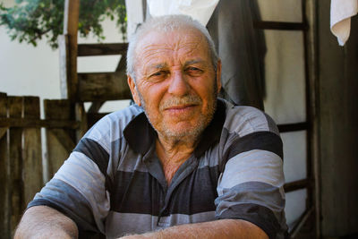 Portrait of senior man outdoors