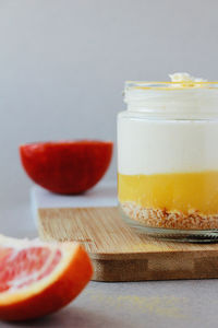 Close-up of orange juice in glass on table