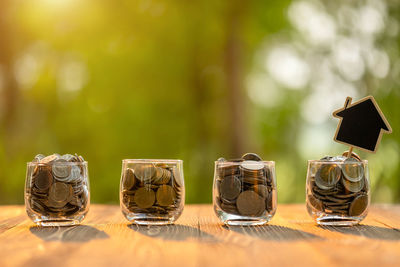 Close-up of wine glasses on table